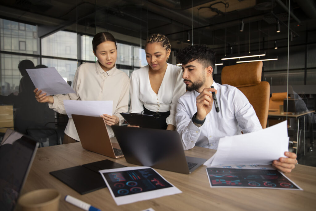 office-workers-using-finance-graphs
